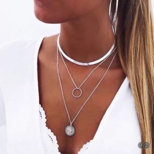 Silver layered necklace with pink crystal pendant